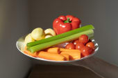 plate of carrots, celery, radish, and bell pepper