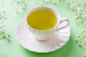green tea in a white teacup