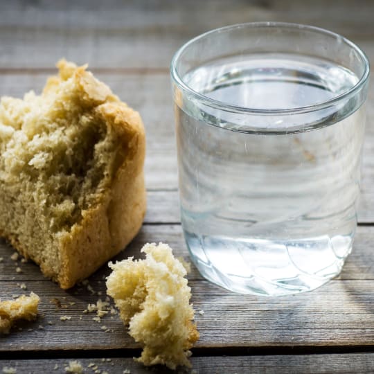 A snack alongside a glass of water